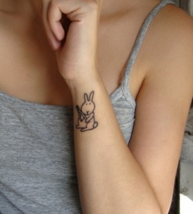 Cute simple rabbit tattoo on body