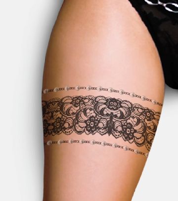 Cute women’s lace tattoo on leg