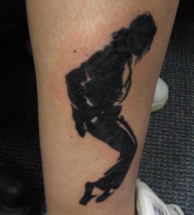 Dancing Michael Jackson on arm tattoo