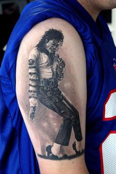 Dancing Michael Jackson tattoo on arm