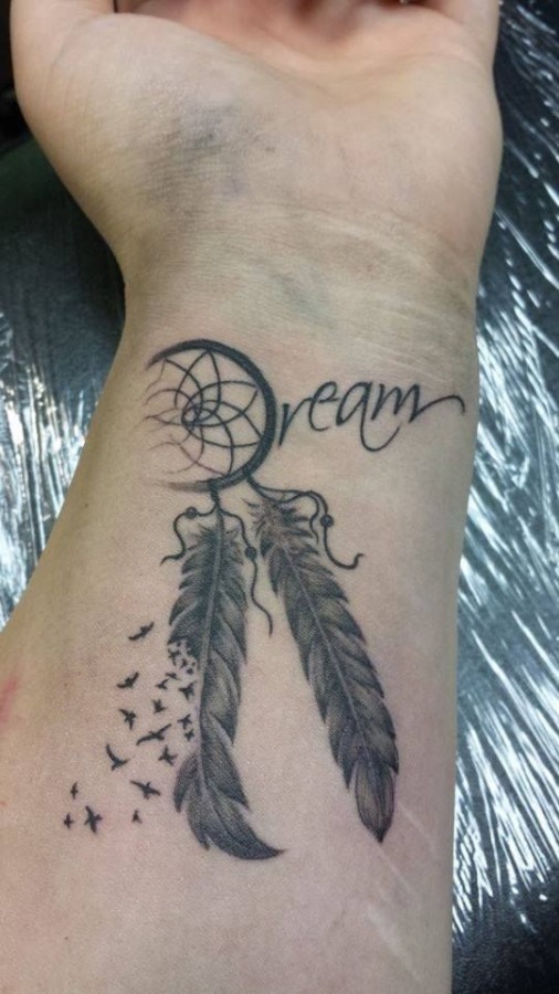 Dream catcher tattoo on wrist