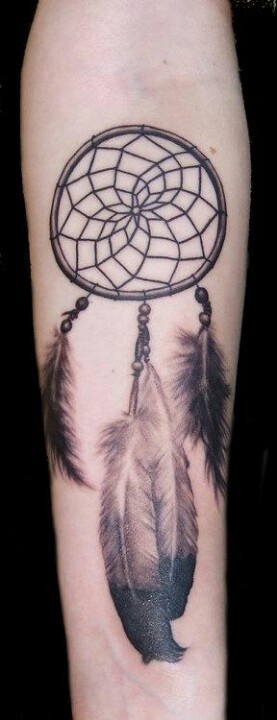 Dream catcher tattoo with awesome feathers