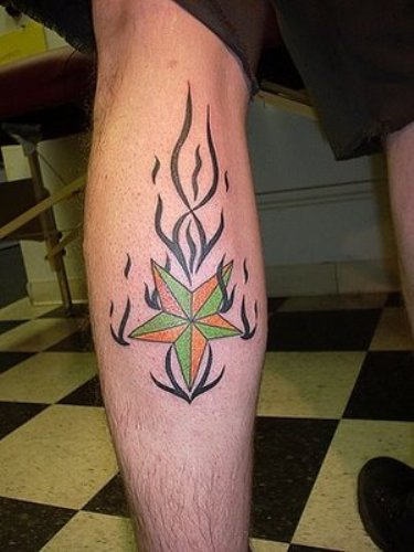 Fire and star tattoo on leg