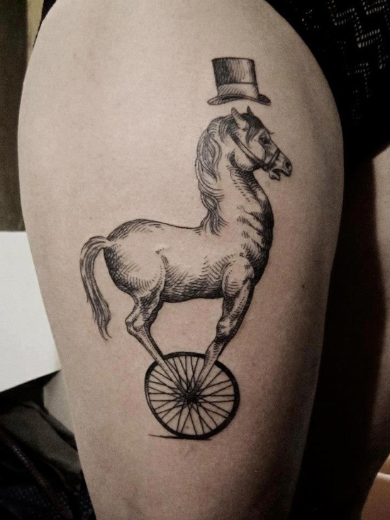 Funny black horse tattoo on arm