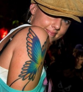 Funny girl butterfly tattoo on arm