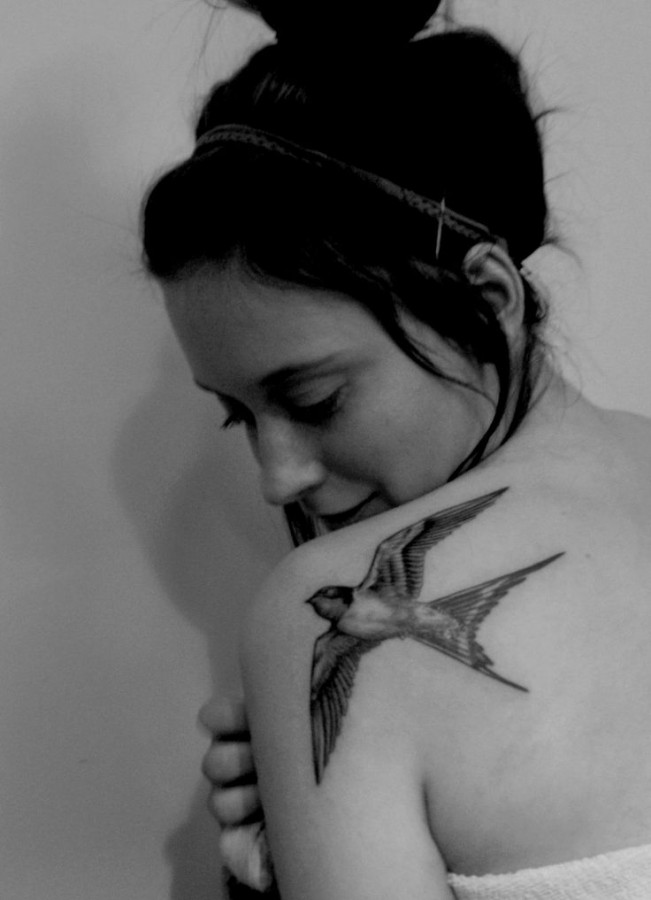 Girl shoulder bird tattoo