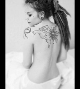 Girl's with dred map tattoo on back