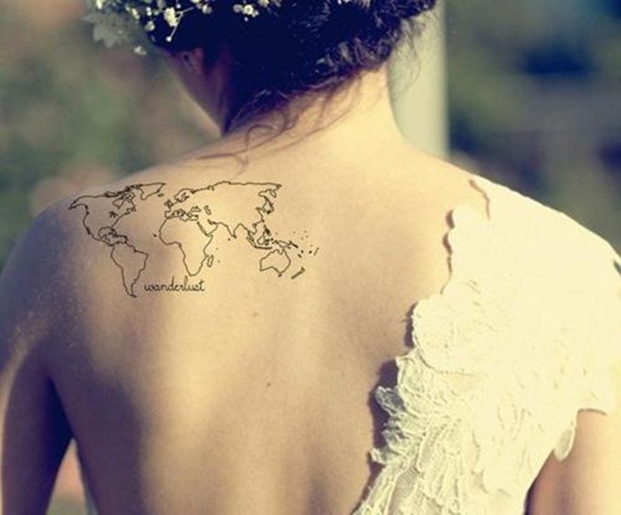 Globe tattoo on back