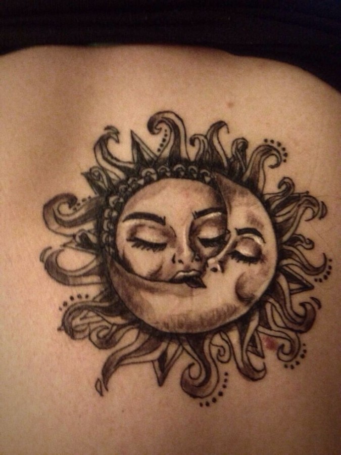 Gorgeous simple black moon tattoo on shoulder