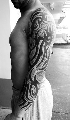 Gorgeous simple tribal tattoo on arm