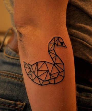 Gorgeous swan origami tattoo on arm