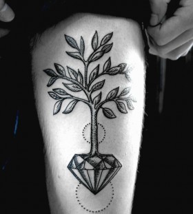 Gorgeous tree crystal tattoo on leg
