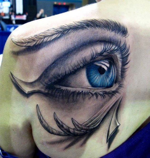 Gorgeous women’s eye tattoo on shoulder