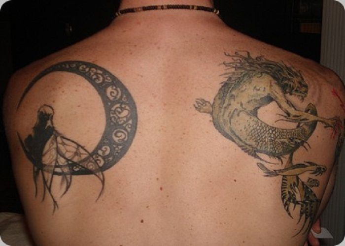 Great dragon and black back moon tattoo