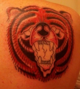 Great looking red bear tattoo on shoulder