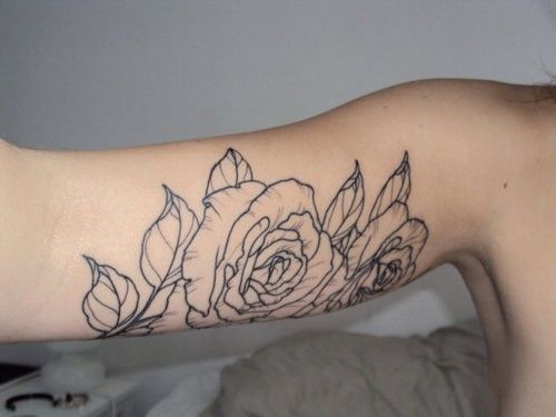 Great looking rose tattoo on arm