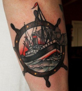 Great looking ship tattoo on arm