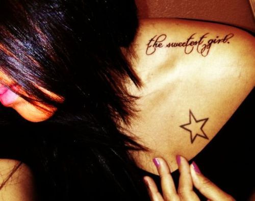 Great words and star tattoo on shoulder