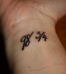 Great wrist number tattoo on arm