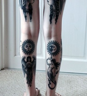 Indian girl and sun tattoo on leg