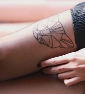 Lovely bear origami tattoo on leg