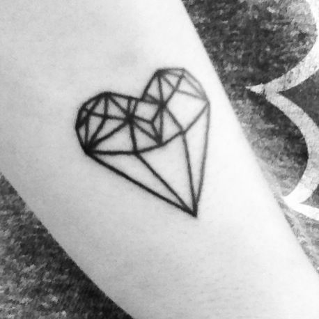 Lovely black heart ornaments tattoo