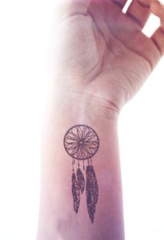 Lovely dream catcher tattoo on wrist