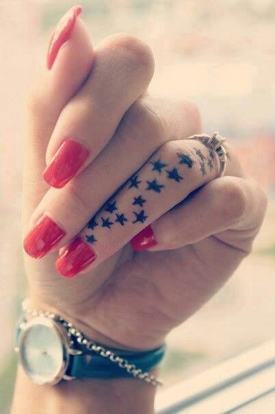 Lovely finger star tattoo on arm