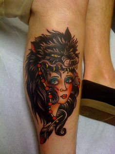 Lovely girl and wolf tattoo on leg