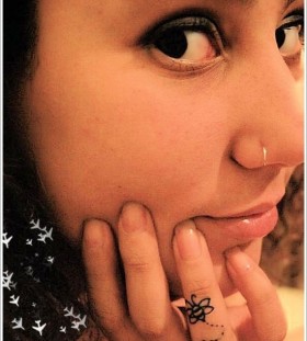 Lovely girl tattoo on finger