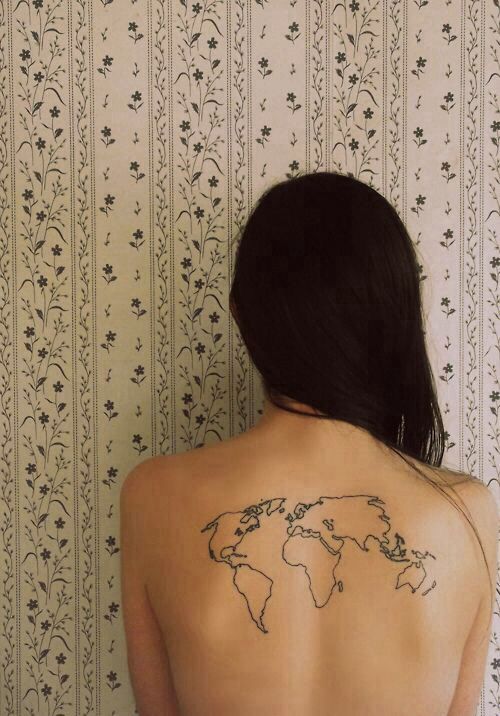 Lovely girl’s map tattoo on back