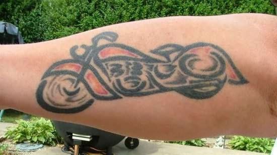 Lovely small bicycle tattoo on arm