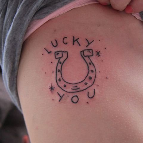 Lucky you horse shoe tattoo