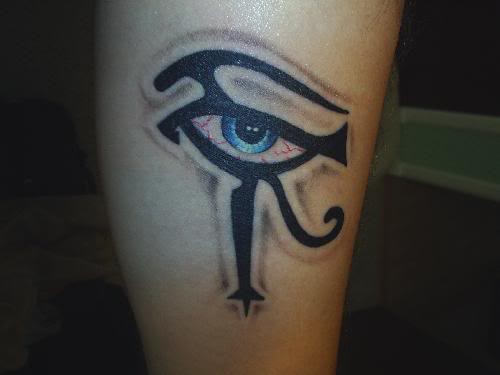 Marvelous blue eye tattoo on leg