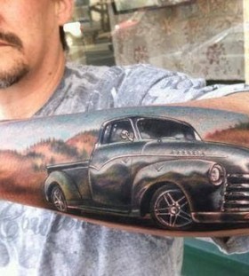 Men's lovely car tattoo on arm