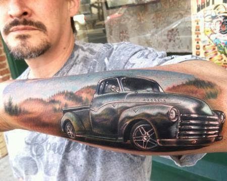 Men’s lovely car tattoo on arm