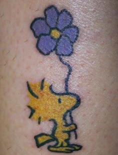 Minimalistic Woodstock Snoopy tattoo