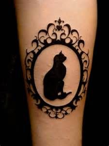 Mirrot and black cat tattoo on leg