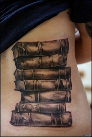 Old black back book tattoo