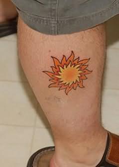 Orang owal sun tattoo on leg