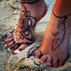 Ornaments tattoos on foot