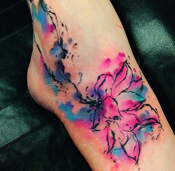 Pink flower watercolor tattoo