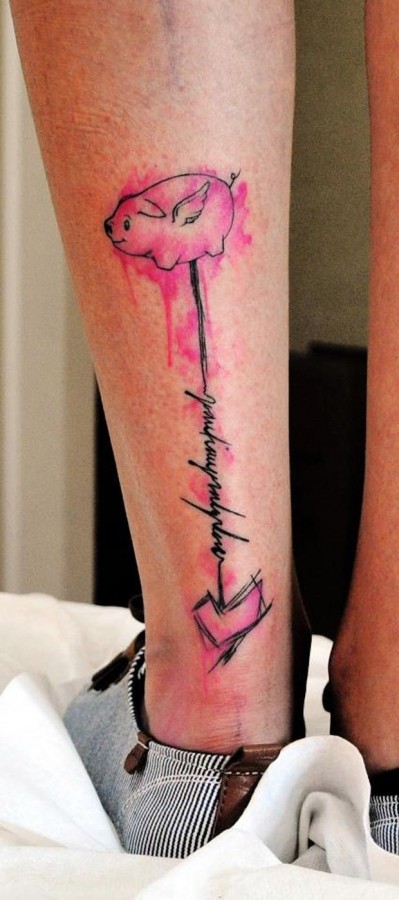 Pink pig quote tattoo on leg