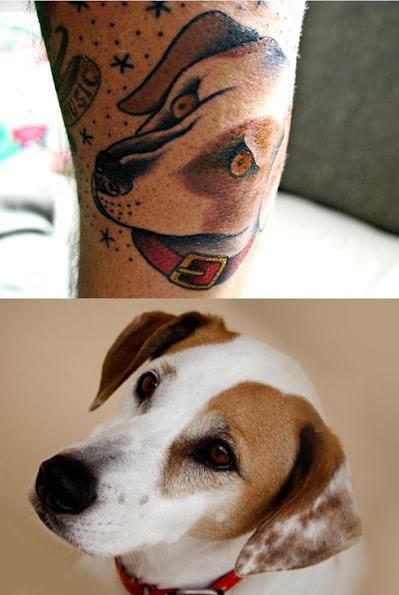 Portrait of realistic dog tattoo on leg