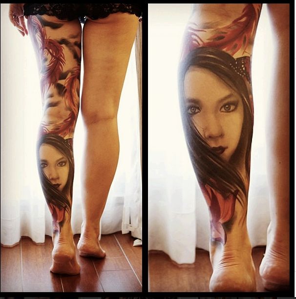 Pretty black girl’s eye tattoo on leg