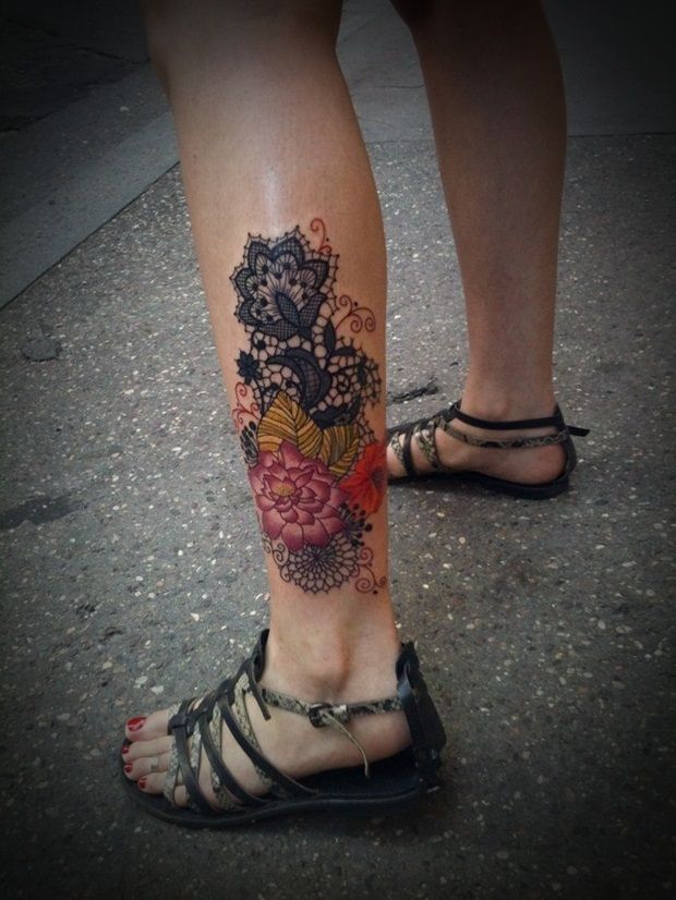 Pretty colorful lace tattoo on leg