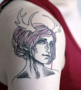Pretty girl face tattoo on arm