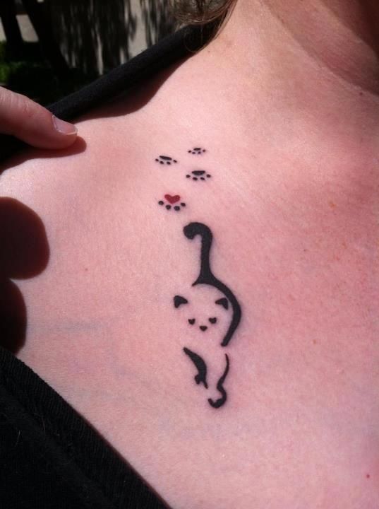 Pretty lovely cat tattoo on arm