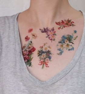 Pretty simple flower tattoo on chest