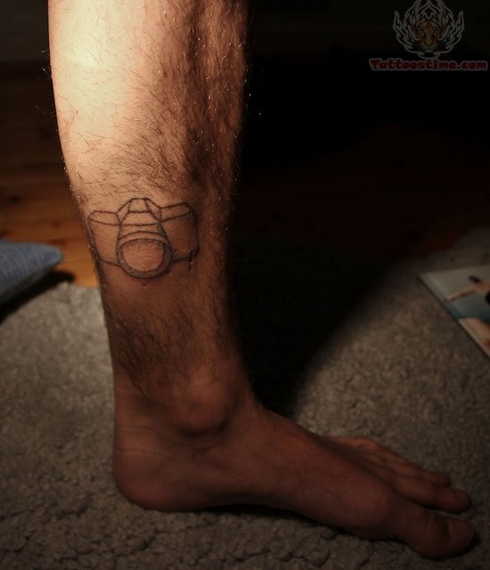 Pretty sweet camera tattoo on leg